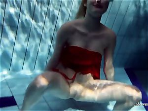 molten platinum-blonde Lucie French teen in the pool